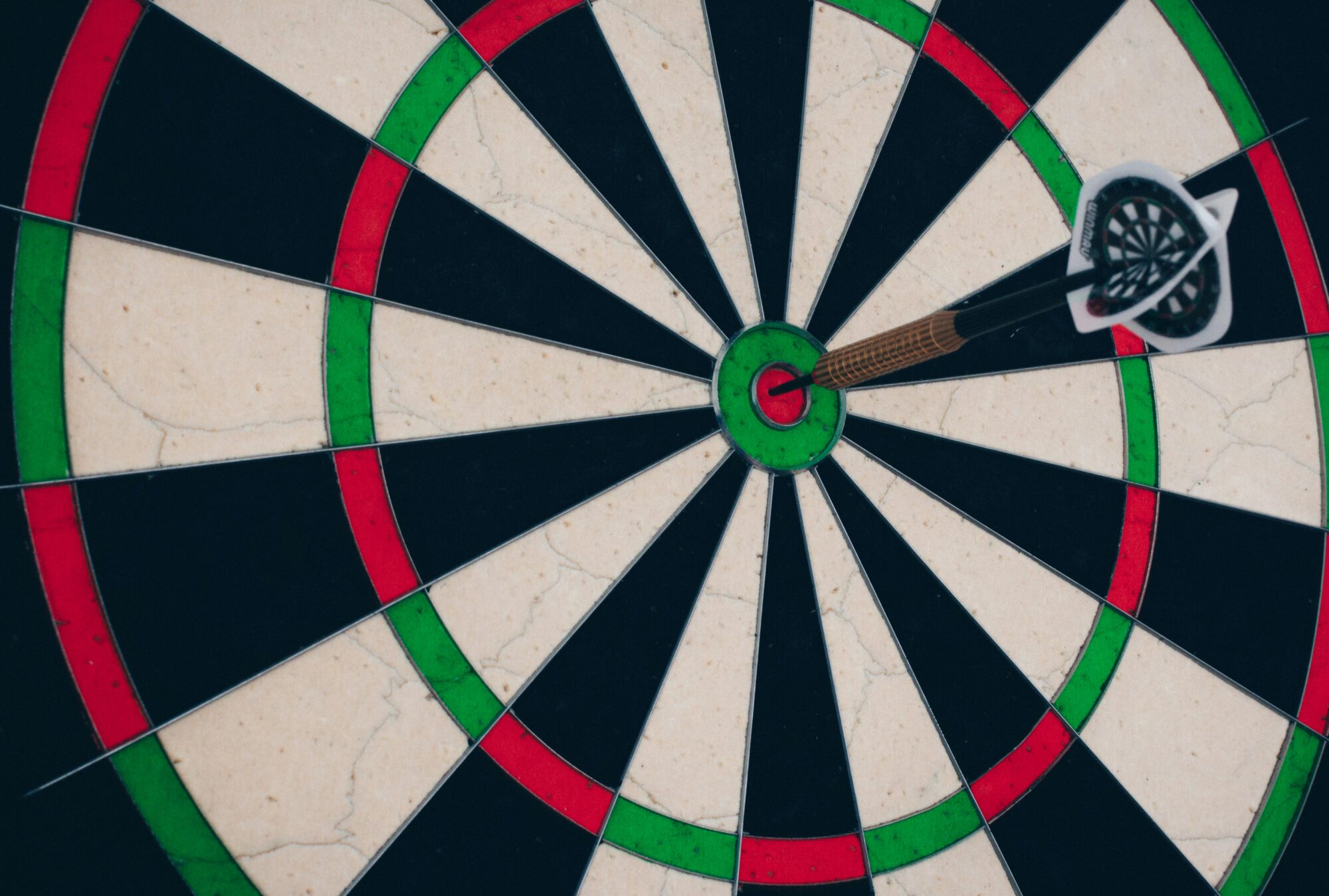 dart board with a single dart showing exclusivity